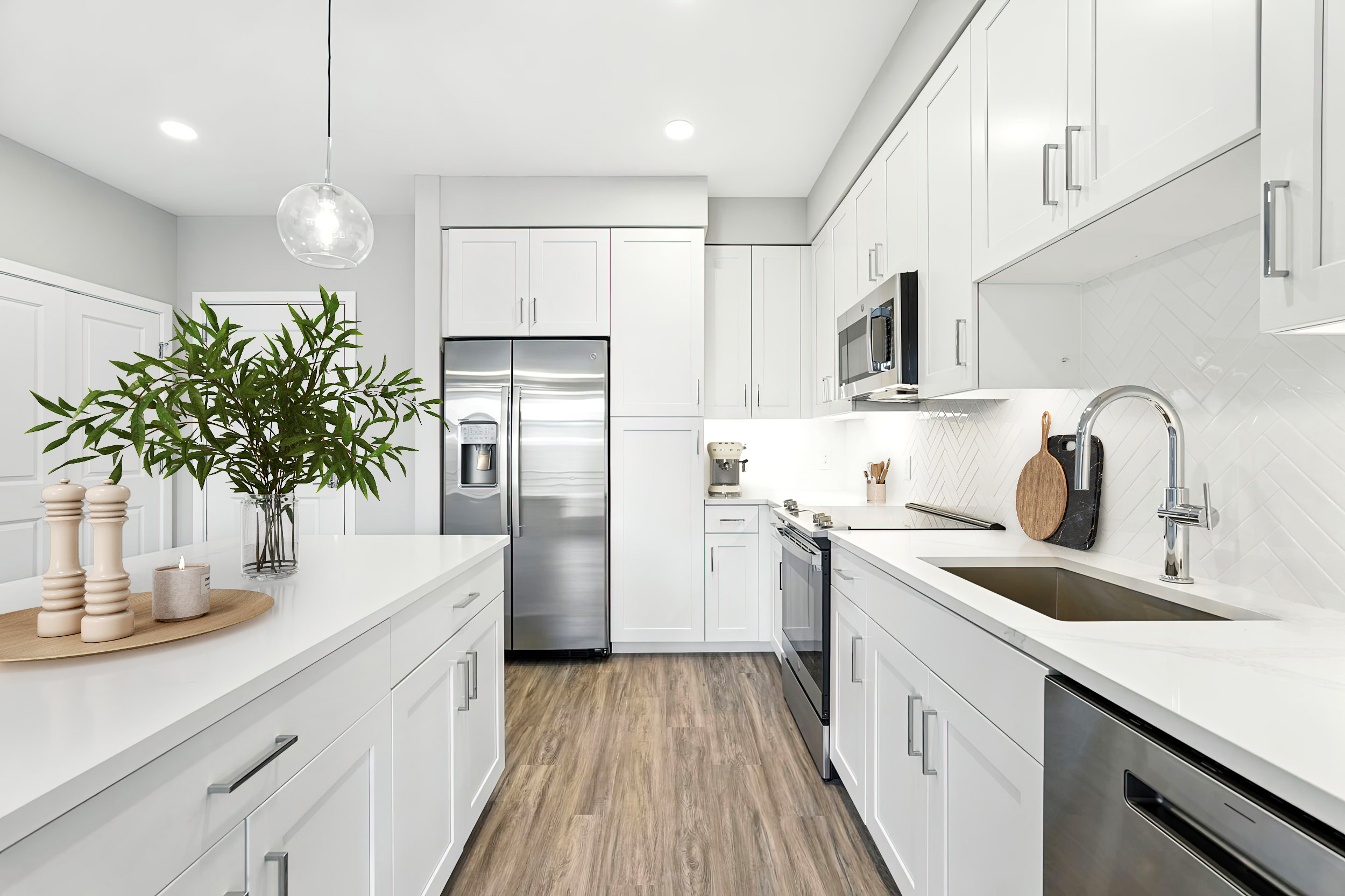 Kitchen with white cabinets and stainless steel appliances