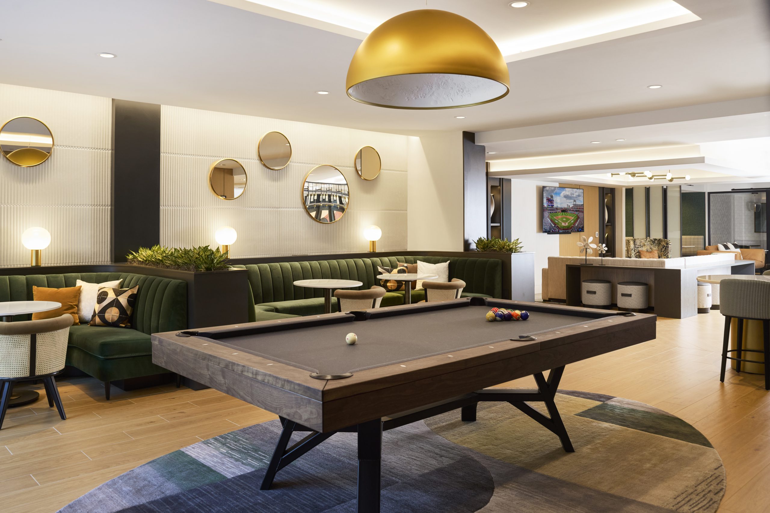 Game room with billards and booth seating