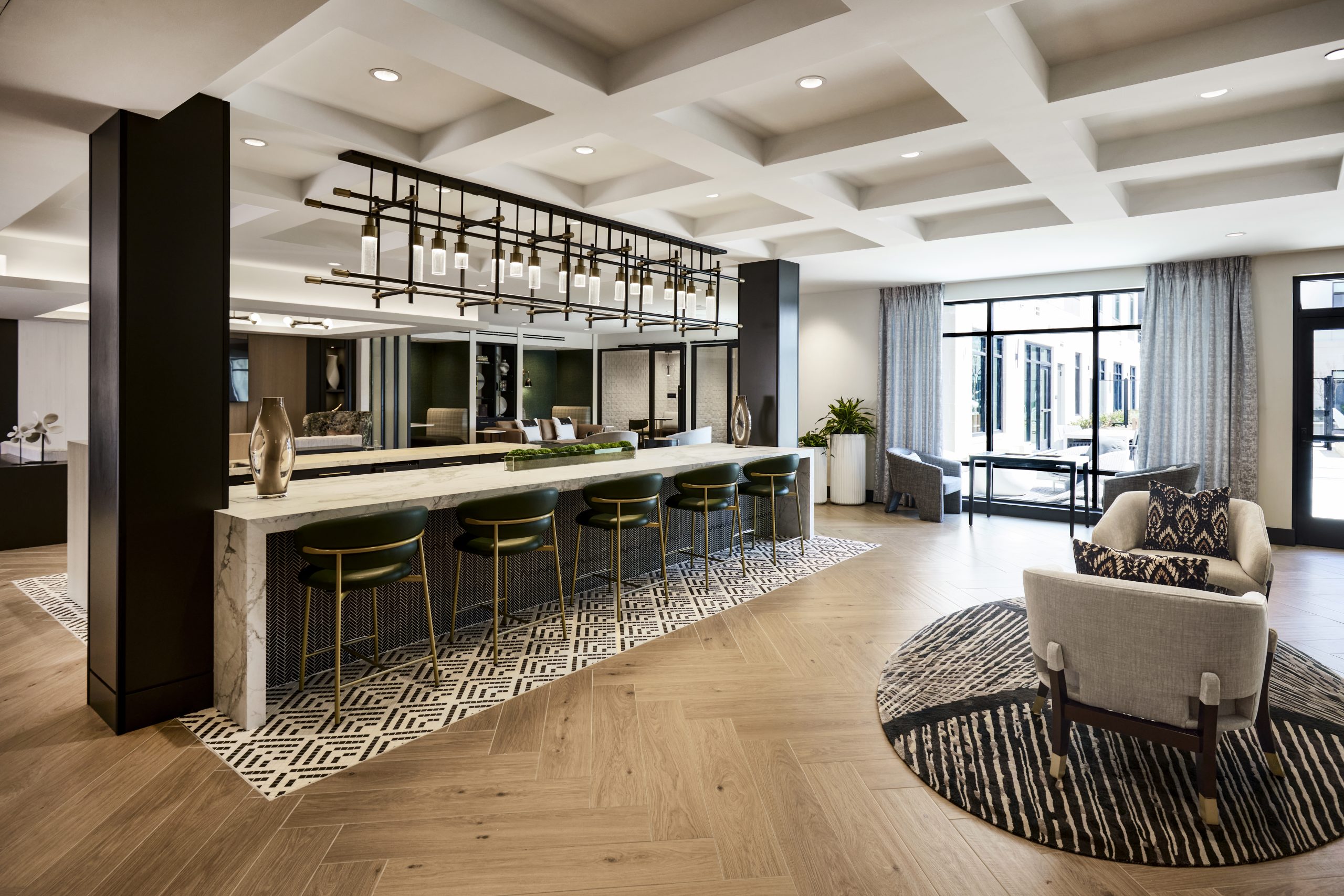 A rendering of a Coulter Place lounge space with bar seating